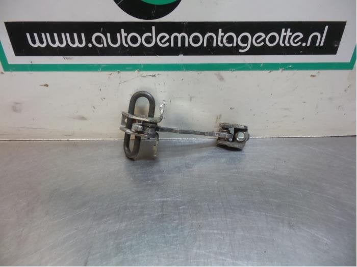 Butée 4portes arrière droite d'un Opel Corsa (Corsa C 00-), -, Opel, Utilisé, -