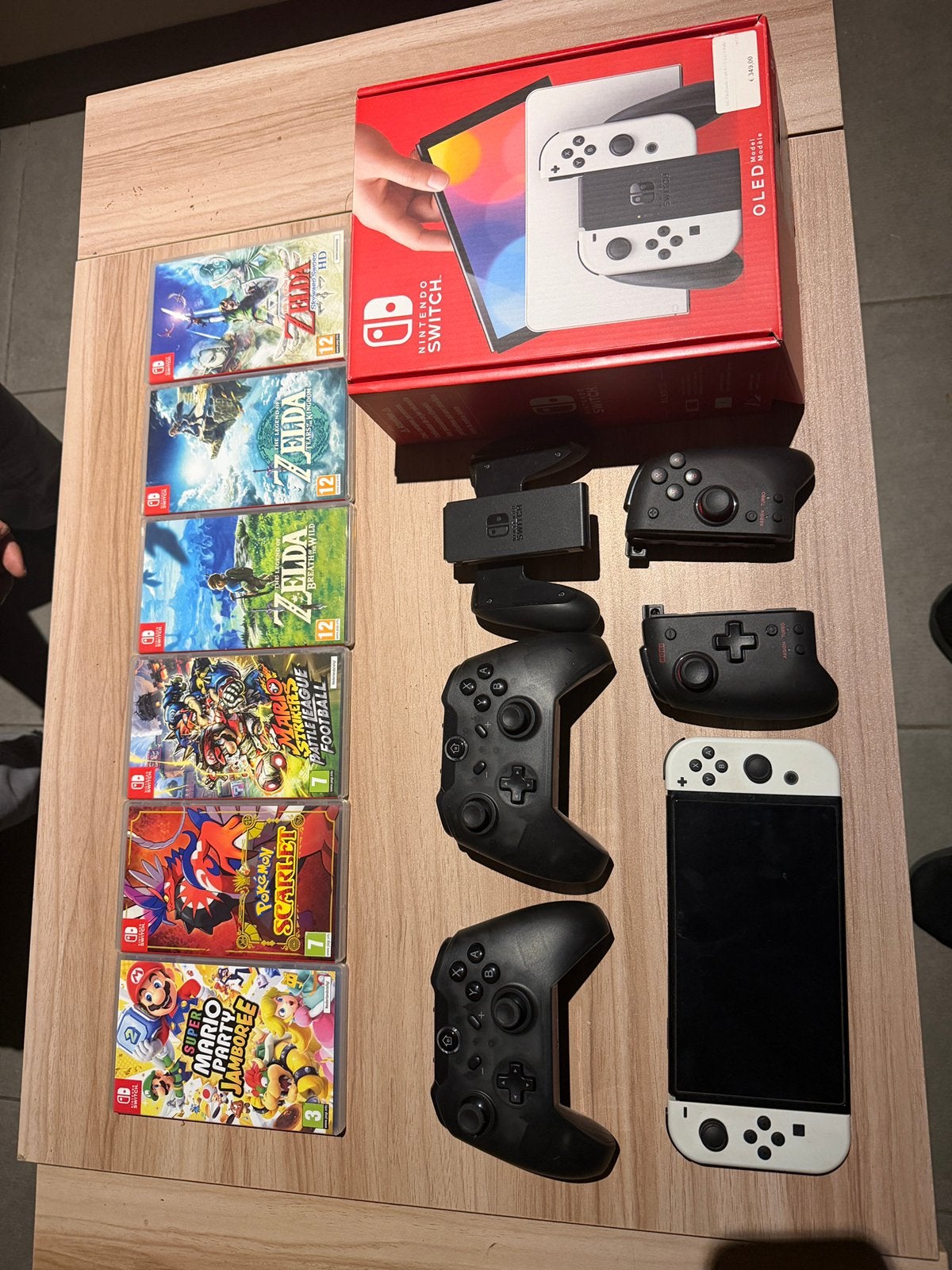 Nintendo Switch OLED + 6 Games + grote controllers, Enlèvement ou Envoi, Comme neuf, Switch OLED