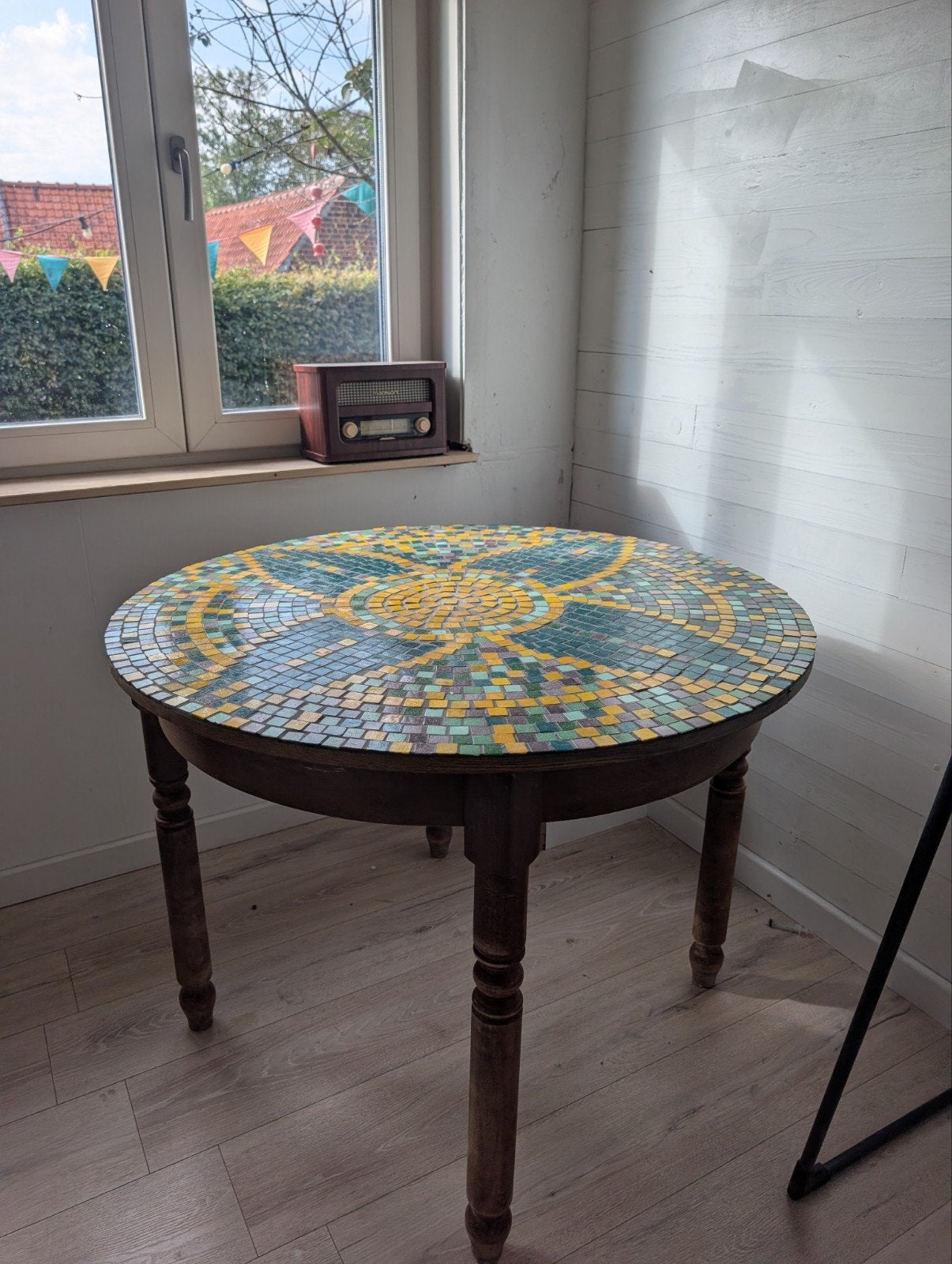 mozaïek tafel, Ophalen