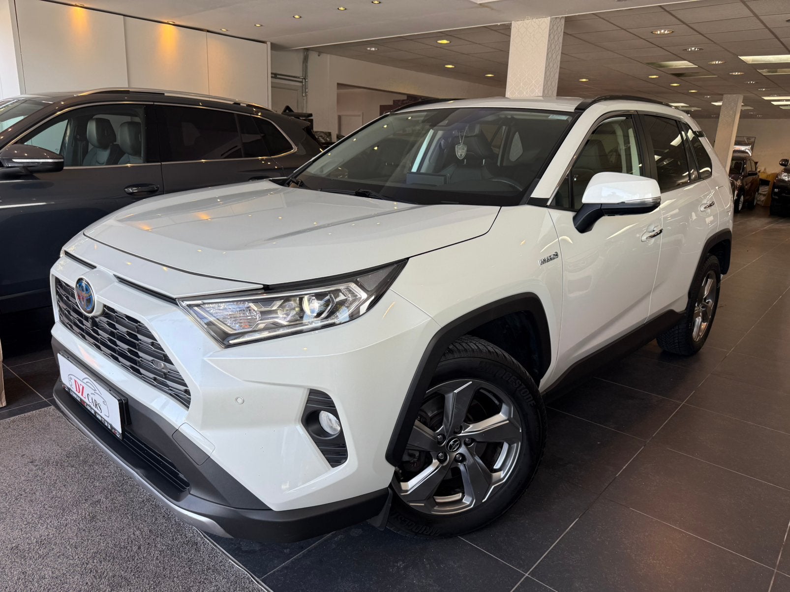 TOYOTA RAV4 HYBRID 2.5I 181CV |NAVI | CAMÉRA 360* | JBL |, Cuir, https://public.car-pass.be/vhr/45d3e6e4-201a-4146-acd9-71a8c52ef550
