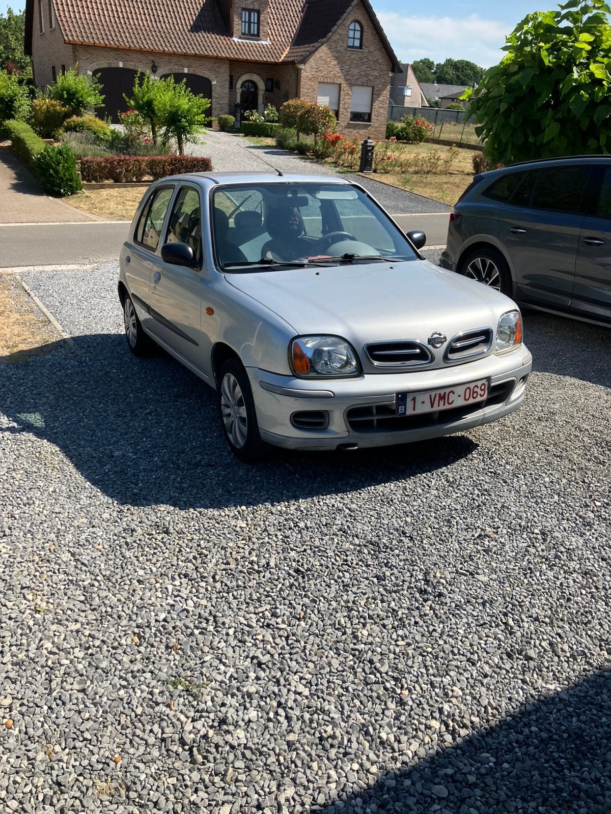 Nissan Micra 1.0b  61.000 km, Autos, Nissan, Argent ou Gris, Achat, Attache-remorque, Boîte manuelle