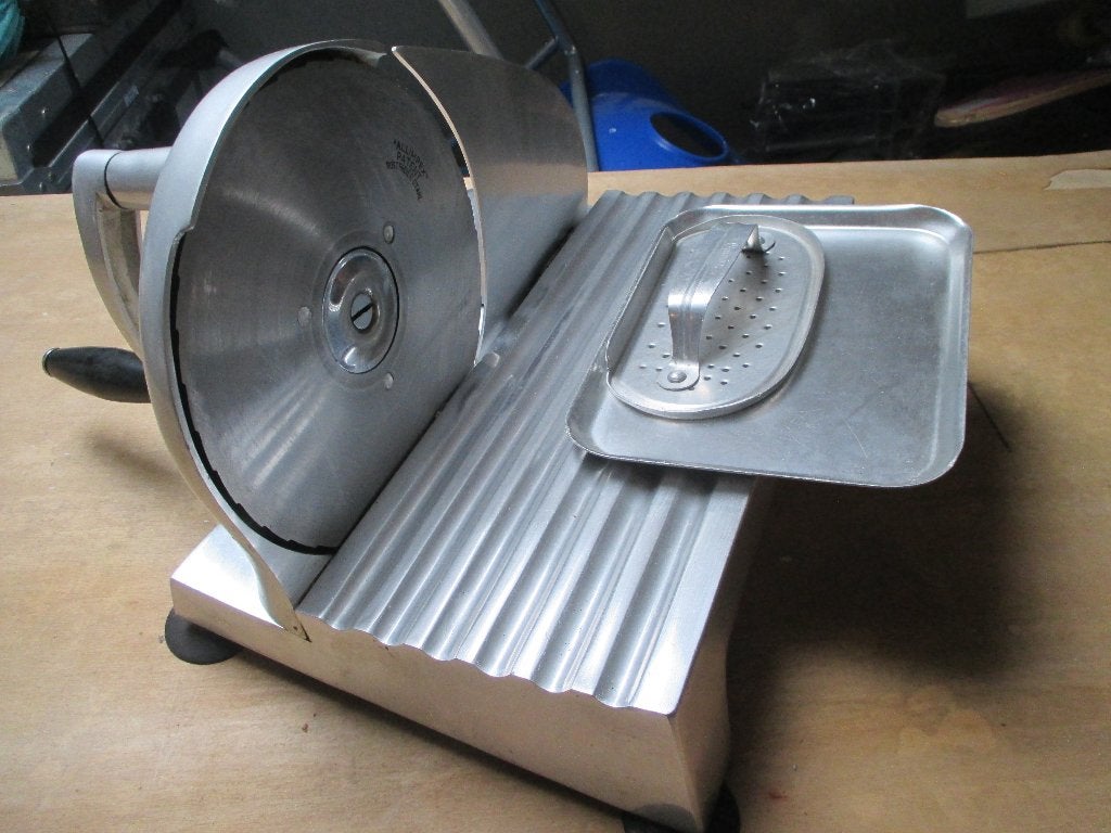 Snijmachine vintage, Ophalen