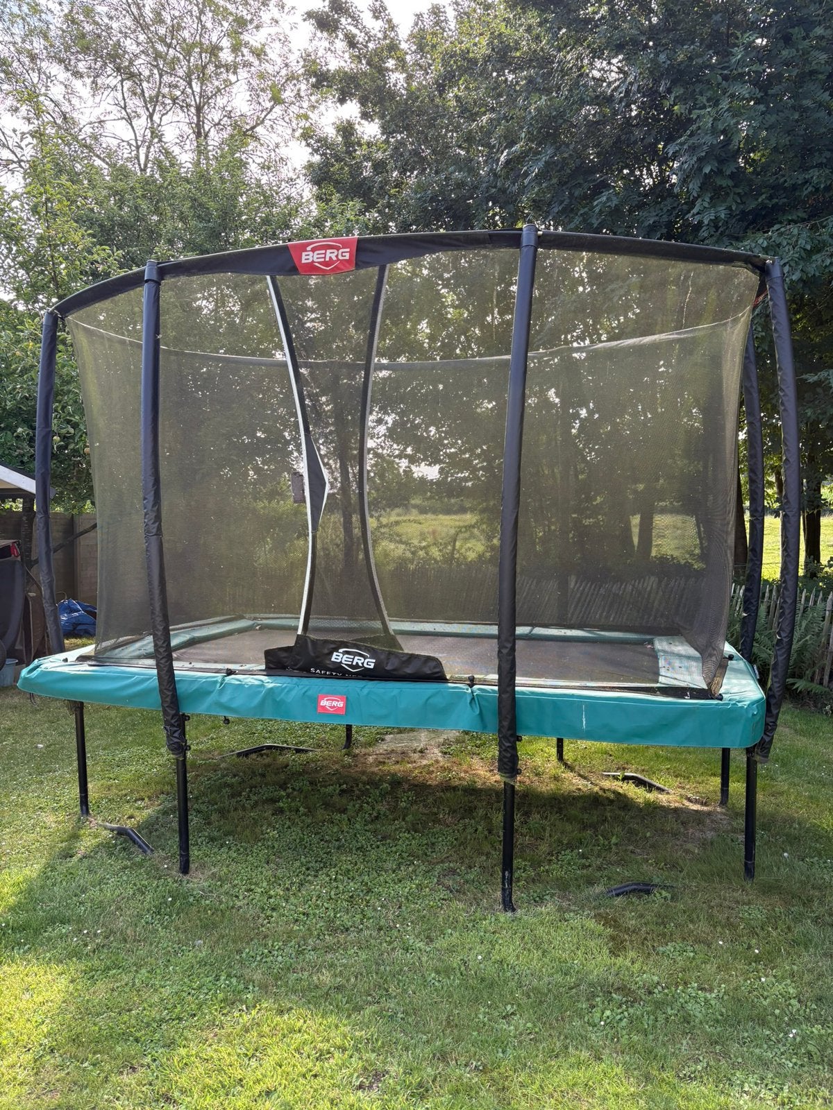 Berg trampoline ultim champion 330 + safety net deluxe, Ophalen, Gebruikt