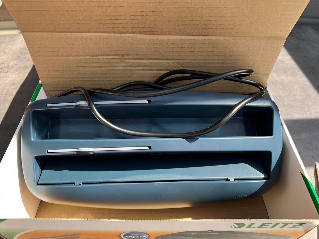 Thermo inbind apparaat Leitz, Ophalen