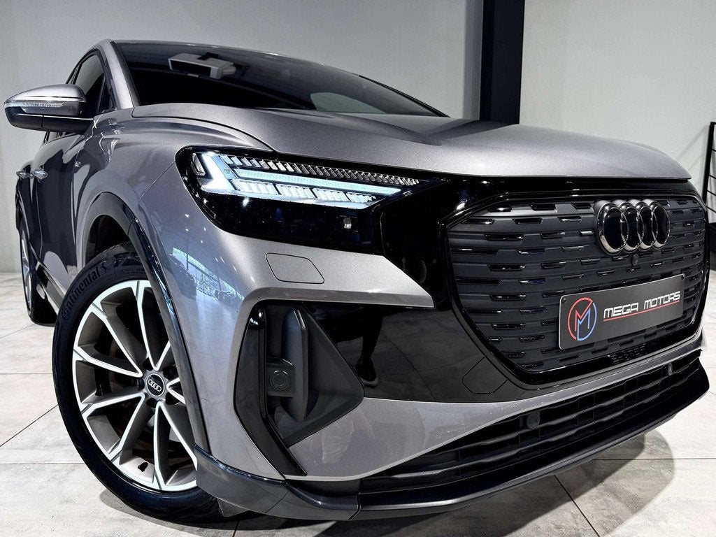 Audi Q4 Sportback e-tron 50 QUATTRO SLiNE !73.301KM! CARPLAY, Auto's, Gebruikt, Zwart, Adaptive Cruise Control, Leder