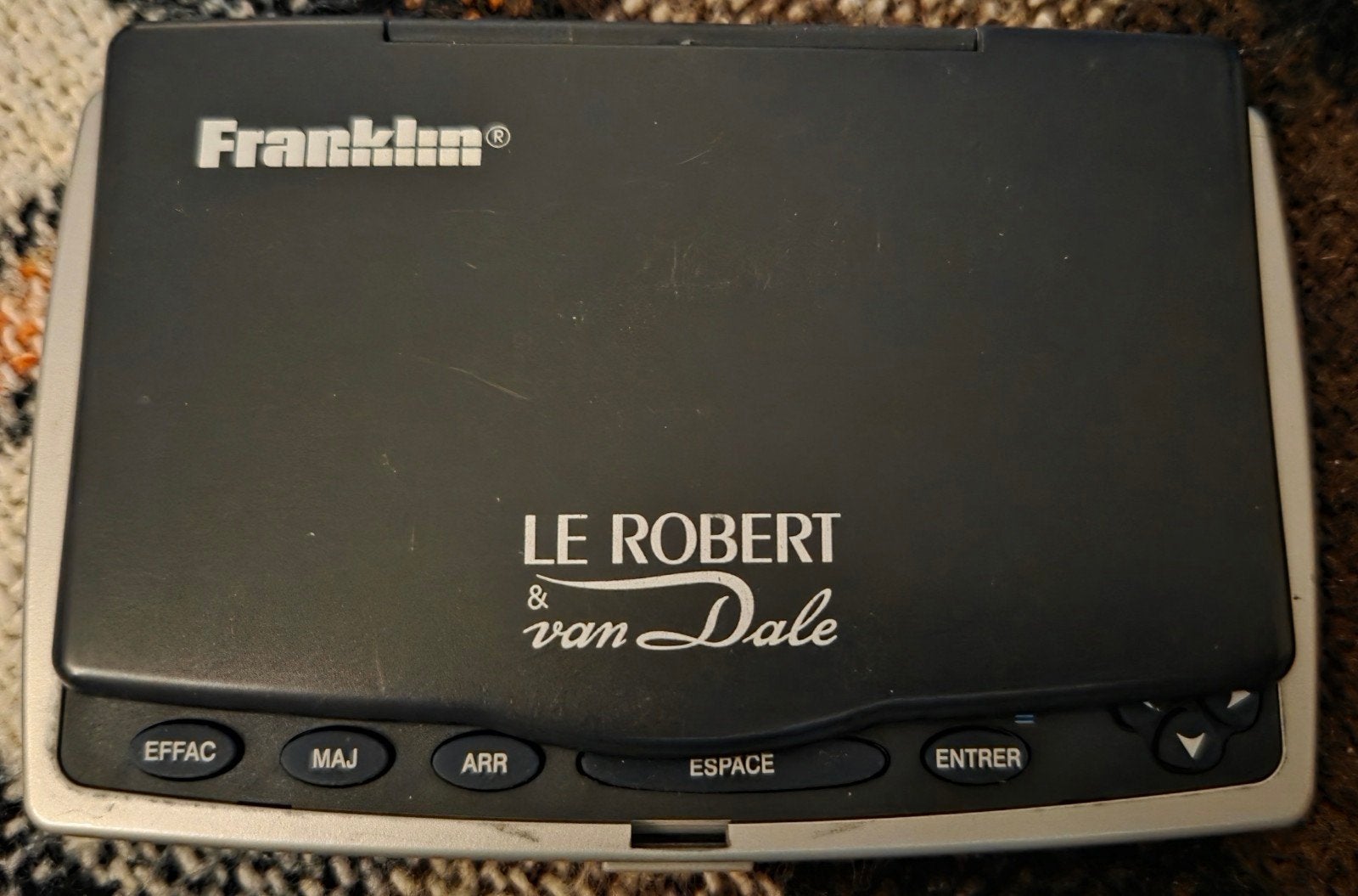 dictionnaire électronique portable de marque Franklin Fr/Ndl, Enlèvement