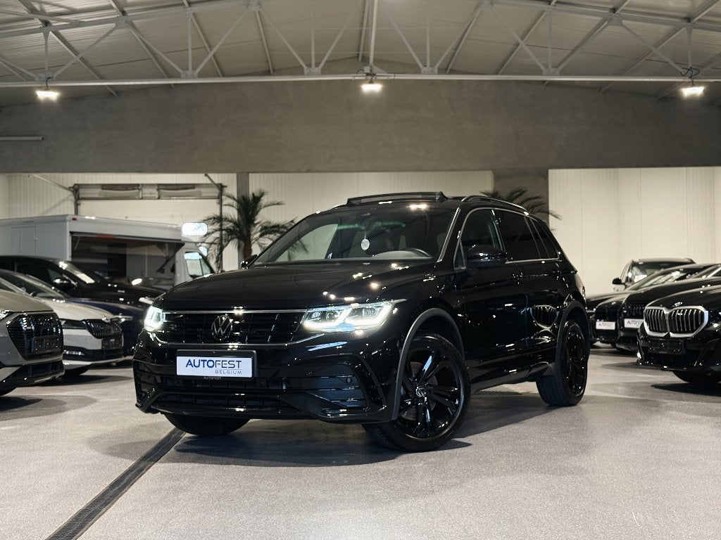 Volkswagen Tiguan E-Hybrid R-Line Full Black - Garantie, Auto's, 42 g/km, Zwart, 5 zetels, 5 deurs