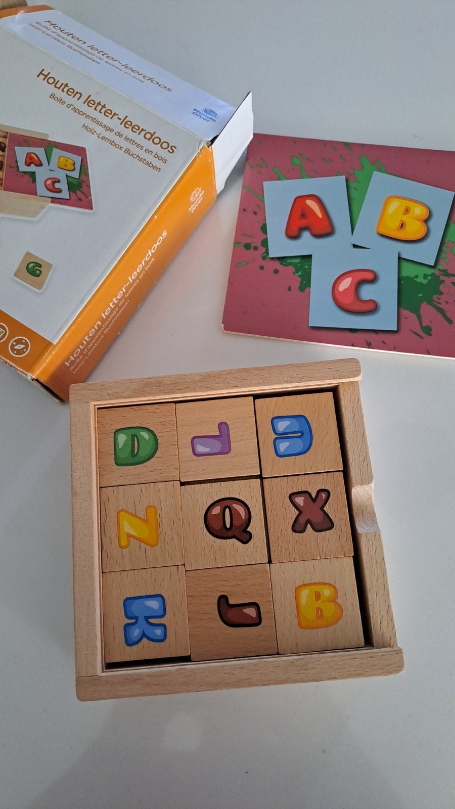 houten letter leerdoos, Ophalen
