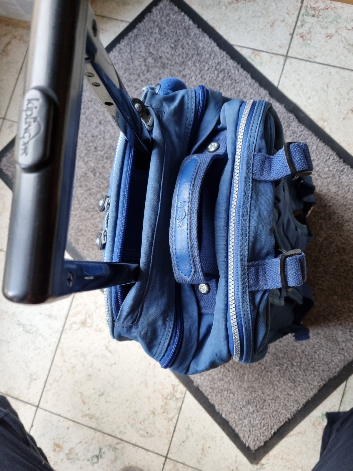 cartable kipling utilisé, Enlèvement