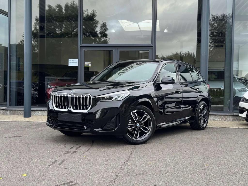 BMW X1 sDrive18i M Sport / PANODAK / TREKHAAK / DODE HOEK, Auto's, BMW, Lichtsensor, Gebruikt, Zwart, 136 pk