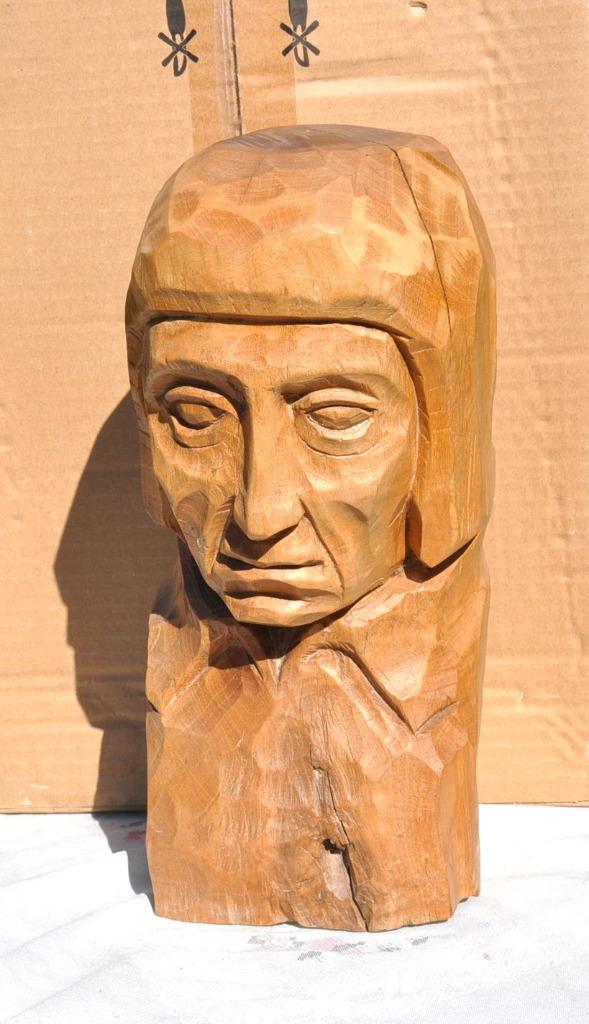 tete en bois sculptée dans tronc, Enlèvement ou Envoi