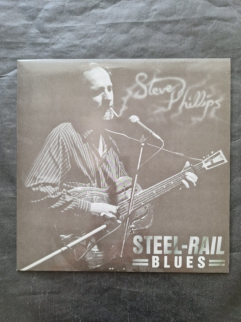 STEVE PHILLIPS  "Steel-Rail Blues" LP (1989) Topstaat!, Cd's en Dvd's, LP, Ophalen of Verzenden, Zo goed als nieuw, Folk Rock