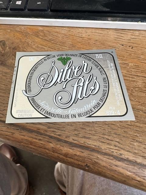 silver pils label etiket Delhaize, Verzamelen, Ophalen of Verzenden, Nieuw, Overige typen, Overige merken
