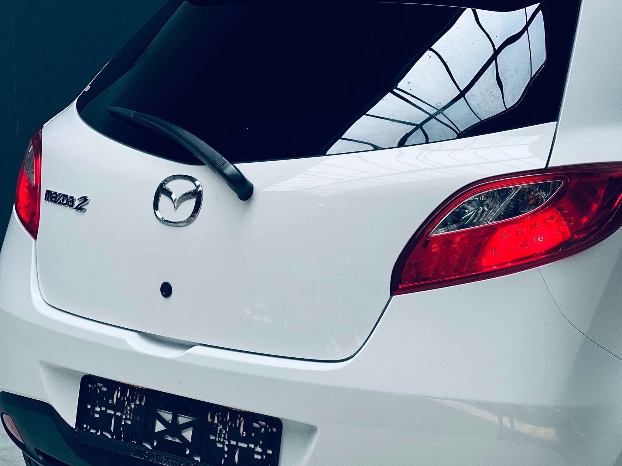 Mazda 2 1.3i *CLIMATISATION*GARANTIE* (bj 2014), Auto's, Voorwielaandrijving, Euro 5, Stof, Zwart