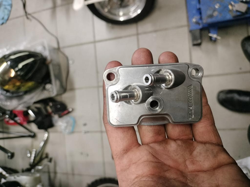 Takegawa oliekoeler adapter, Motoren, Ophalen