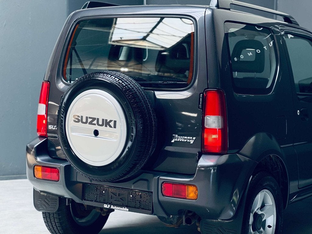 Suzuki Jimny 1.3i *AUTOMATIQUE*GPS*CLIMATISATION* (bj 2012), Auto's, Gebruikt, Bedrijf, Vierwielaandrijving, SUV of Terreinwagen