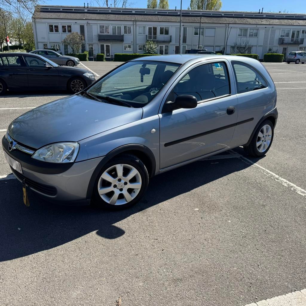 Prachtige Opel Corsa 1.2i met 152 000 km, Auto's, Voorwielaandrijving, Stof, Zwart, Handgeschakeld