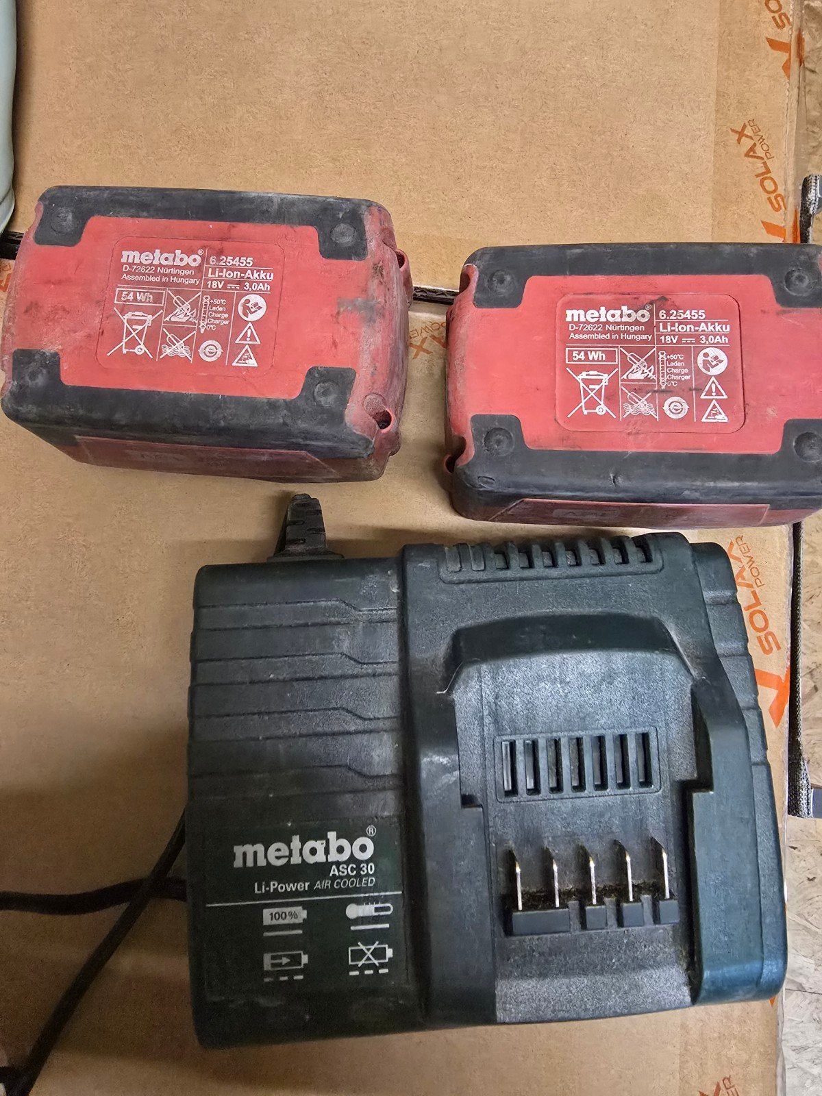 Lader en 2x batterij metabo, Ophalen