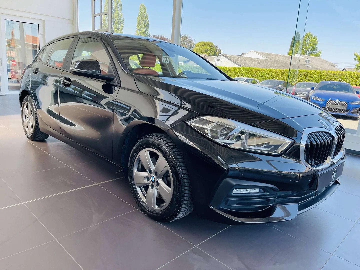 BMW 1 Serie 116 iA * GARANTIE + COCKPIT + LED + GPS PRO + CU, Autos : Divers, Berline, Automatique, 1499 cm³, Noir