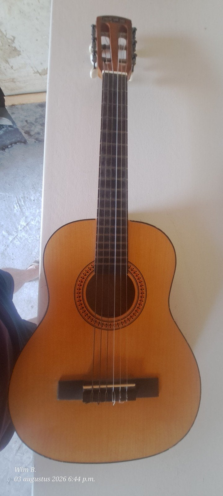 Kinder gitaar, Ophalen
