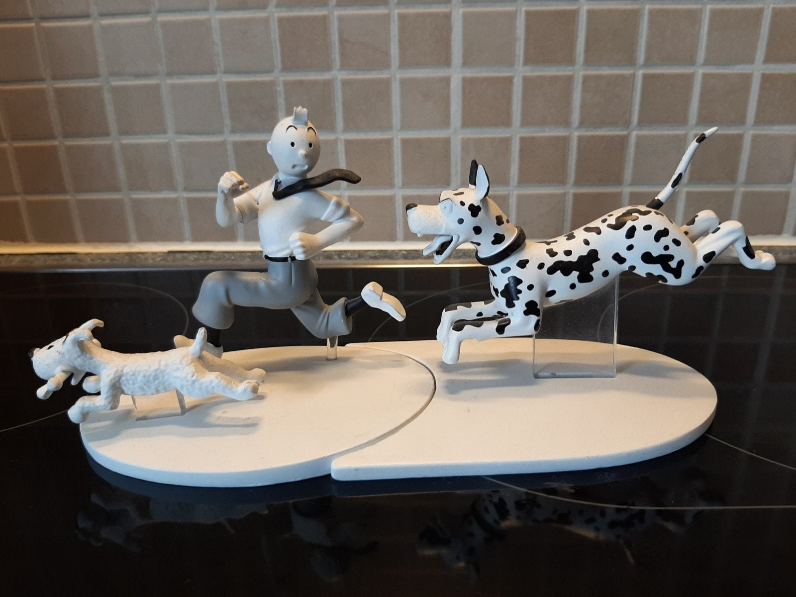 zwart wit kuifje beeldje,  met boekje, Ophalen