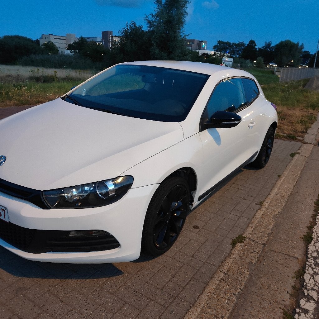 Volkswagen scirocco 1.4 2011, Auto's, Volkswagen, Wit, Handgeschakeld, Grijs, Particulier