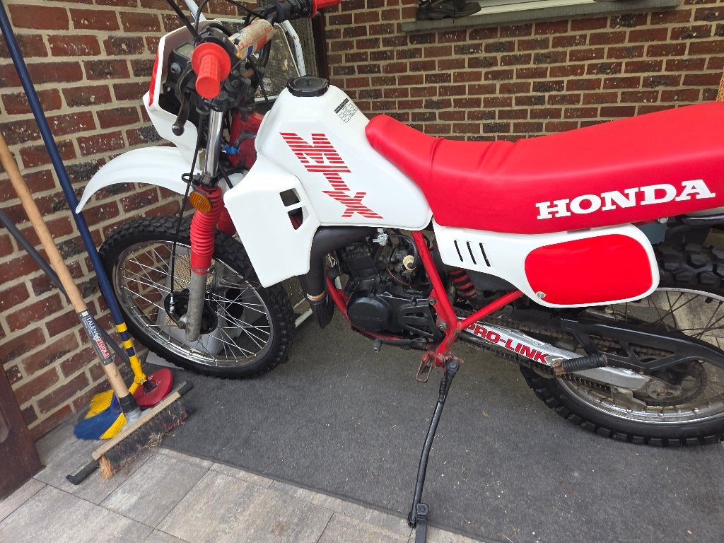 Honda mtx AD06 (liquid cooled) originele uitlaat gezocht, Ophalen of Verzenden