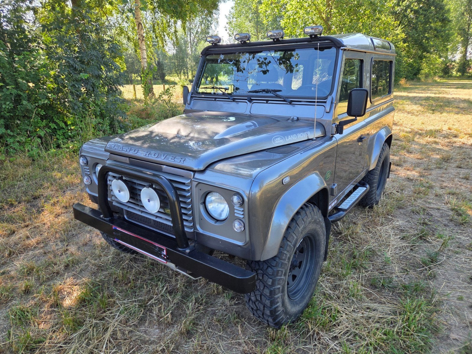 Land Rover Defender 90 lichte vracht, Auto's, Land Rover, Euro 5, Zwart, Leder en Stof, Defender