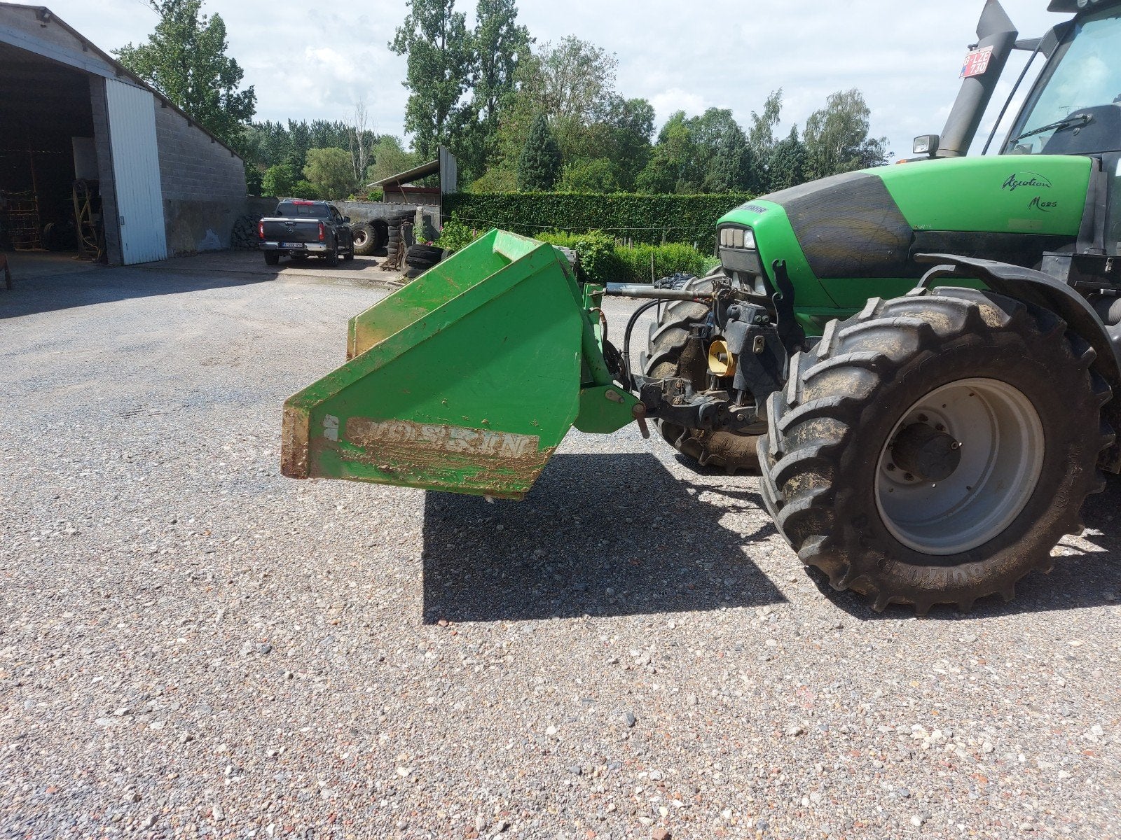 Grondbak voor tractor, Ophalen