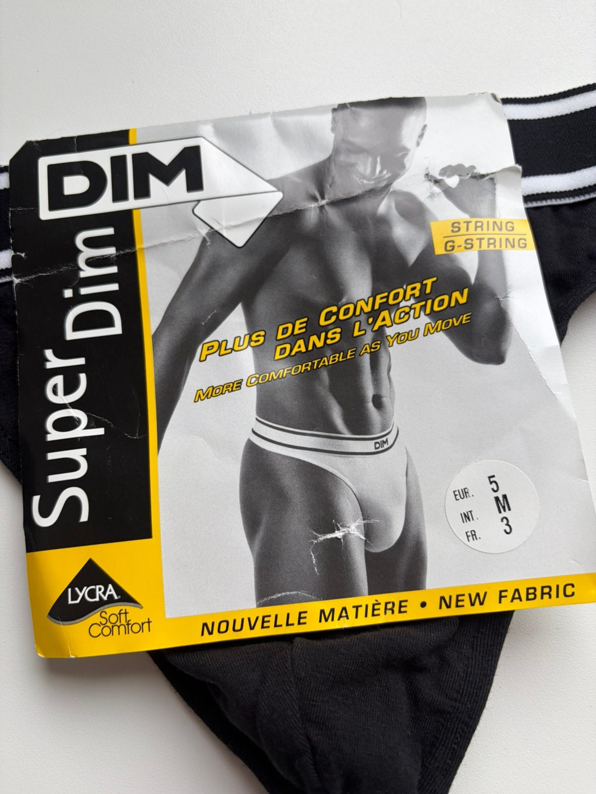 String Super DIM, Envoi, Noir, Slip