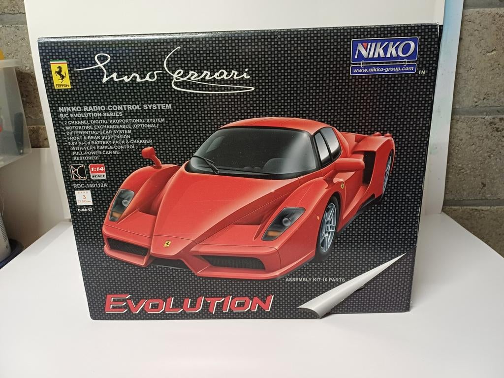 Nikko Evolution Enzo Ferrari radiografisch 1/14 NIEUW, Neuf, Enlèvement ou Envoi, Voiture on road, Échelle 1:14