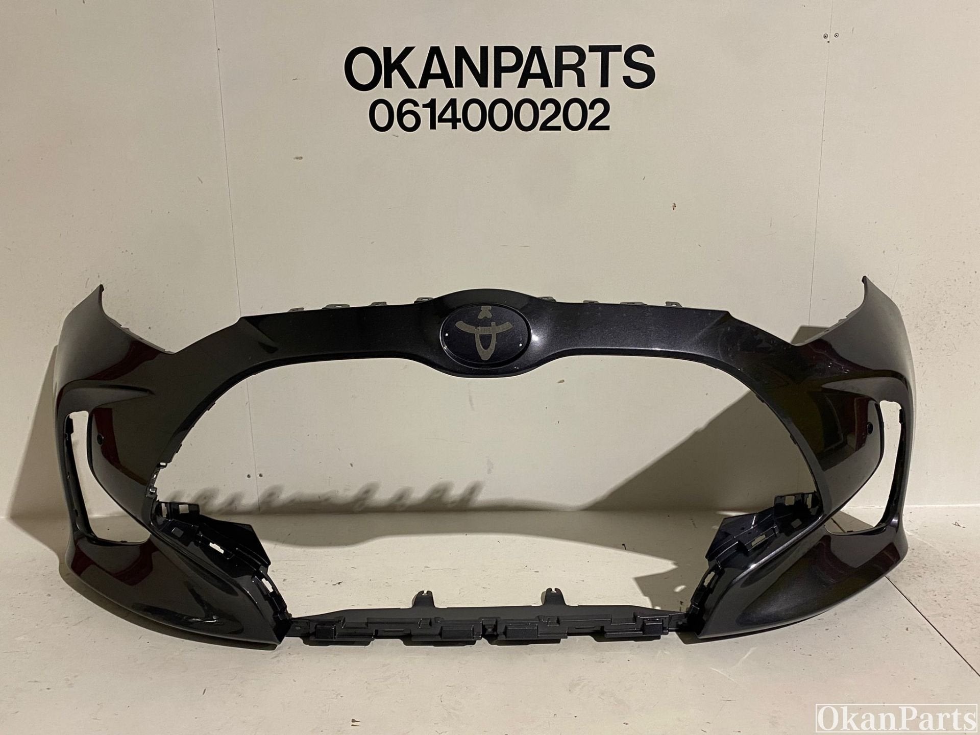 Toyota Yaris XP210 Voorbumper 52119-ODAOO, Gebruikt, Voor, Bumper