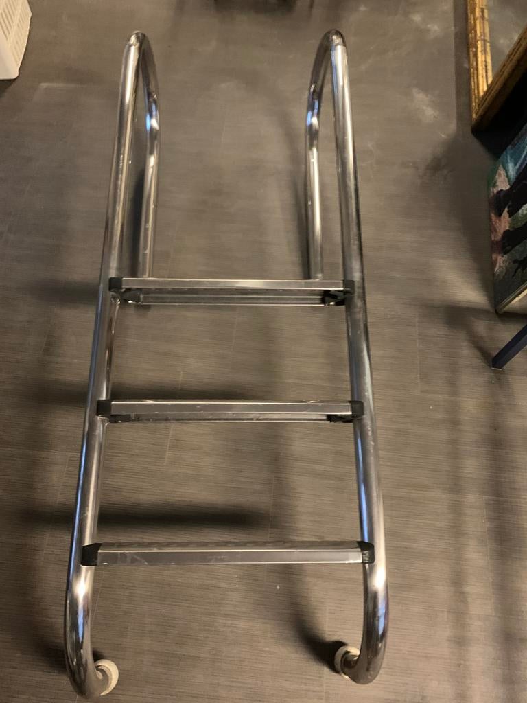 Zwembadtrap, Ophalen