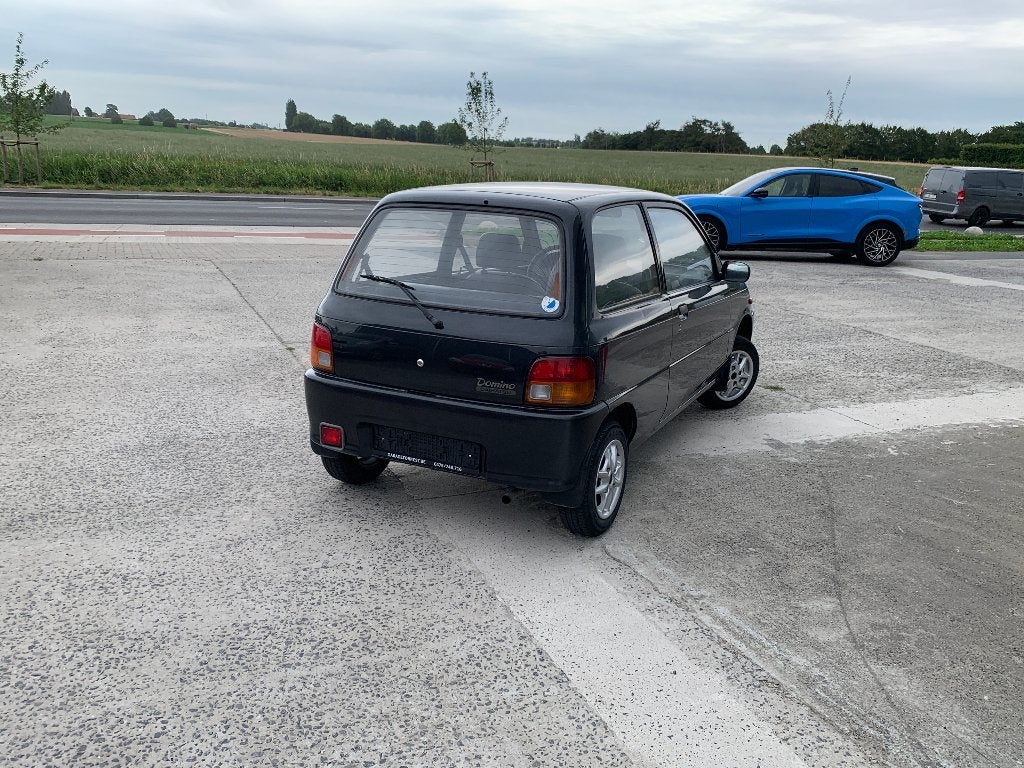 Daihatsu Domino Automaat 1 ste eigenaar, Auto's, 4 zetels, Stof, Zwart, Bedrijf