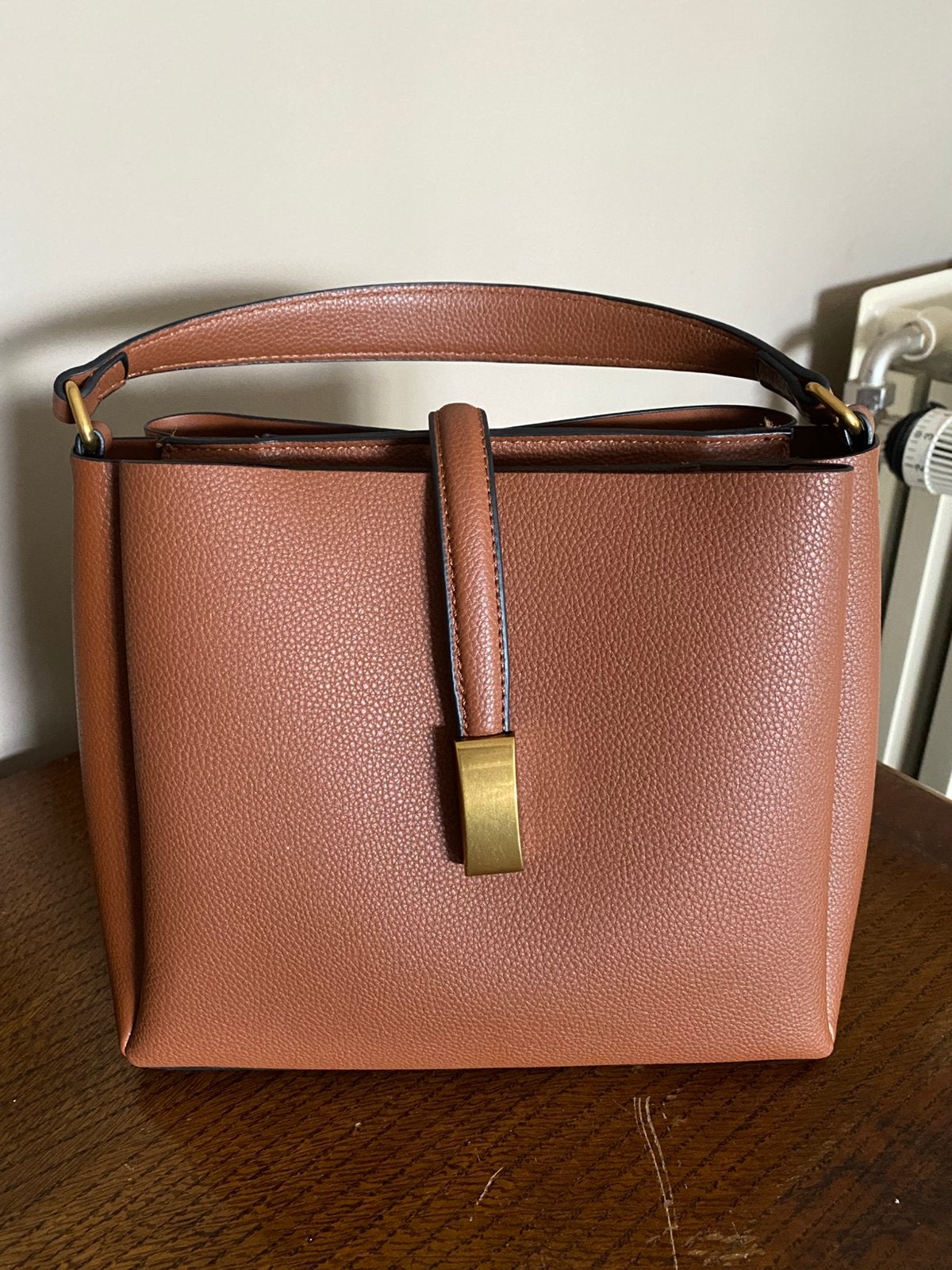 Sac couleur camel, Ophalen