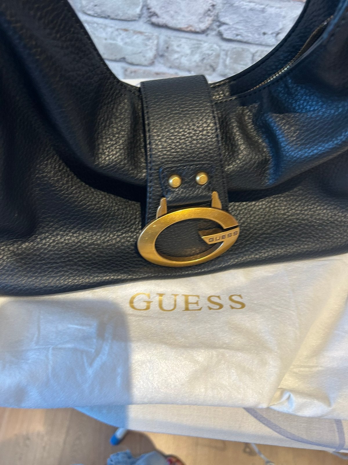 Guess, Ophalen, Zo goed als nieuw