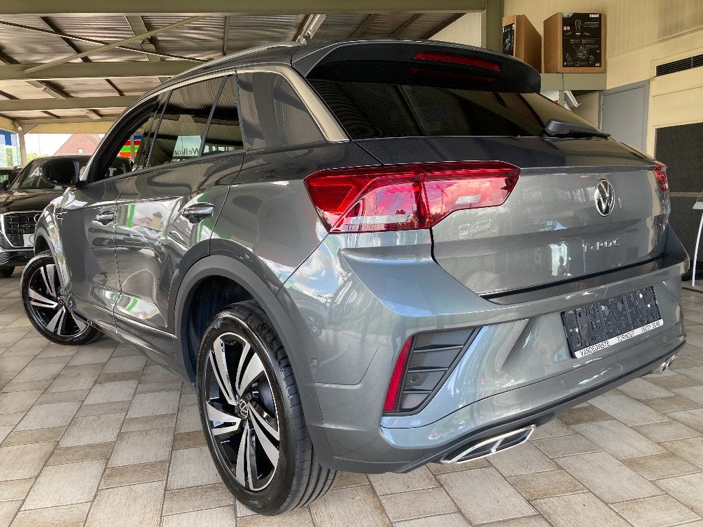 T-ROC R-LINE 150tsi -AUTOMAAT -App -ACC -Camera -LOADED!!!, Auto's, 1498 cc, 4 cilinders, Leder en Stof, https://public.car-pass.be/vhr/1dcc4e14-82f7-4449-a447-6554cdb4bf14