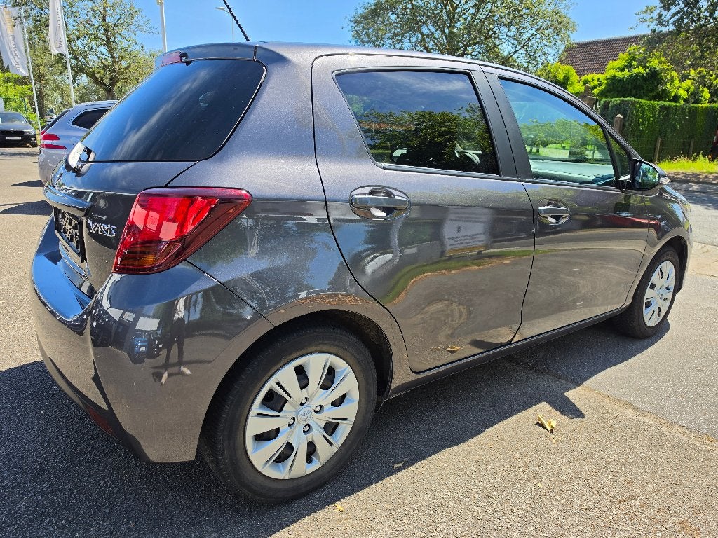 Toyota Yaris 1.33i, 2016, 61.300km, AC, Keuring, 1j Garantie, Auto's, Voorwielaandrijving, Stof, Euro 6, 4 cilinders