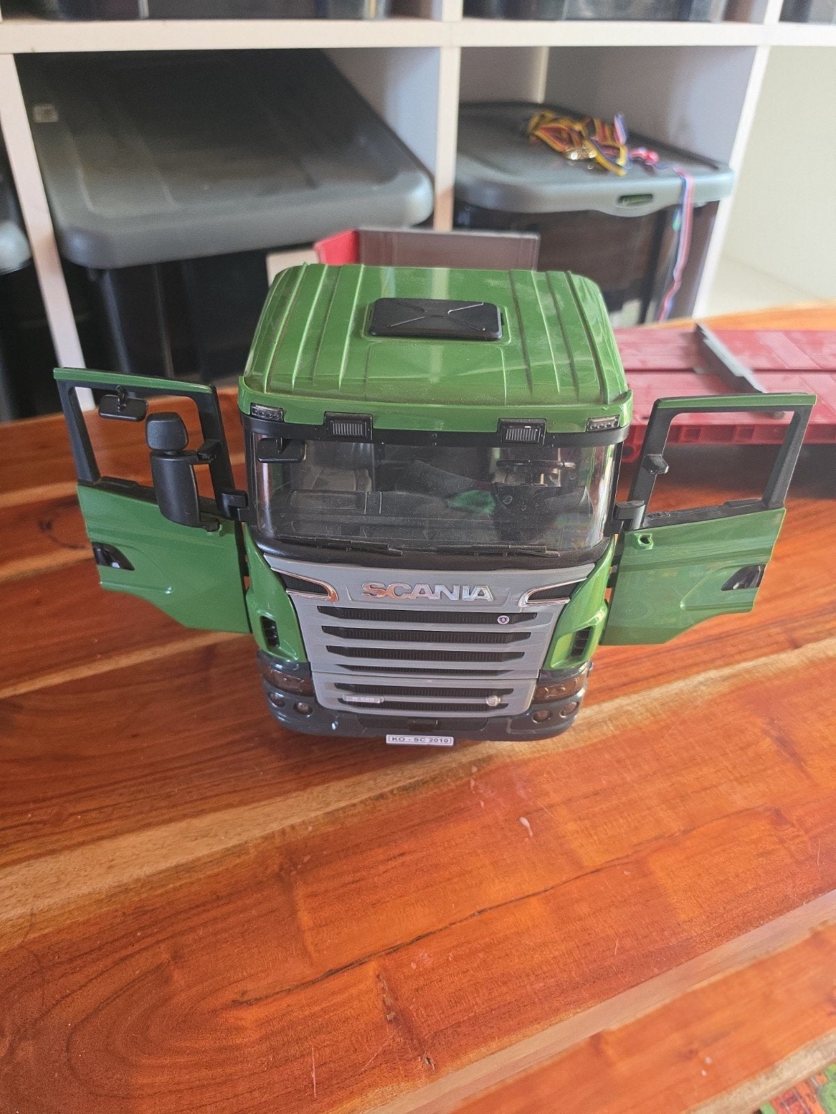 Scania Bruder avec remorque porte-engins, Enlèvement