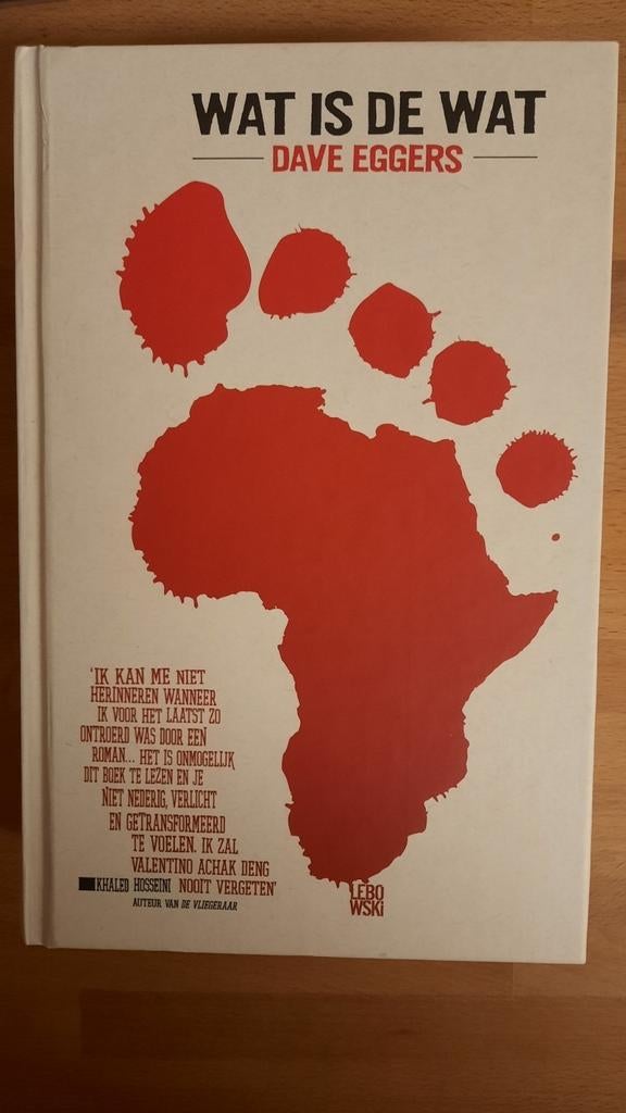 Dave Eggers - Wat is de wat, Boeken, Biografieën, Zo goed als nieuw, Ophalen of Verzenden