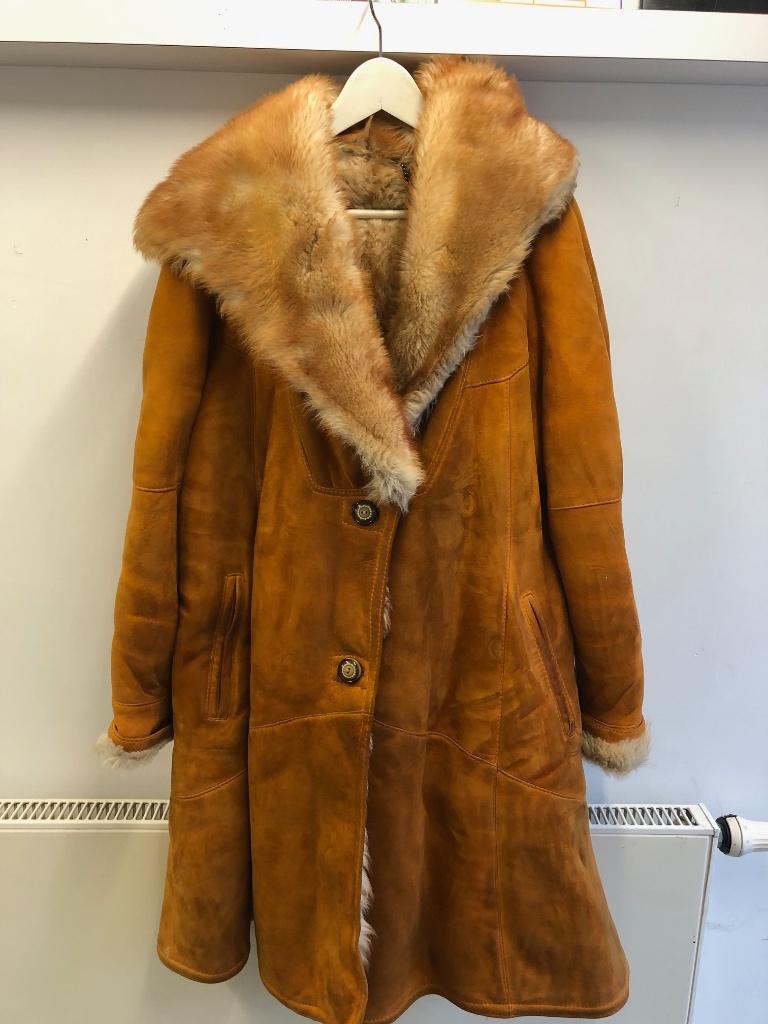 Jas van Pelsland met certificaat, Kleding | Dames, Jassen | Winter, Pelsland, Maat 42/44 (L), Oranje, Ophalen of Verzenden