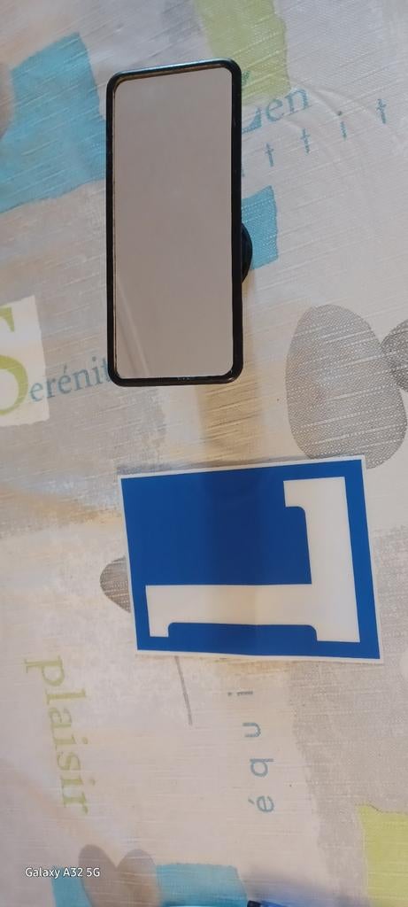 L autostatique et rétroviseur intérieur pour le permis auto, Enlèvement