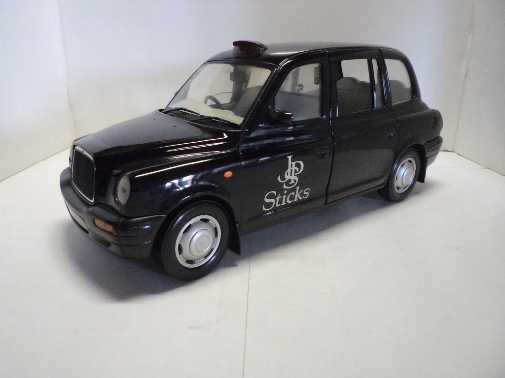 London Taxi JPS SunStar, Hobby en Vrije tijd, Modelauto's | 1:18, Ophalen of Verzenden, Zo goed als nieuw, Auto, Sun Star