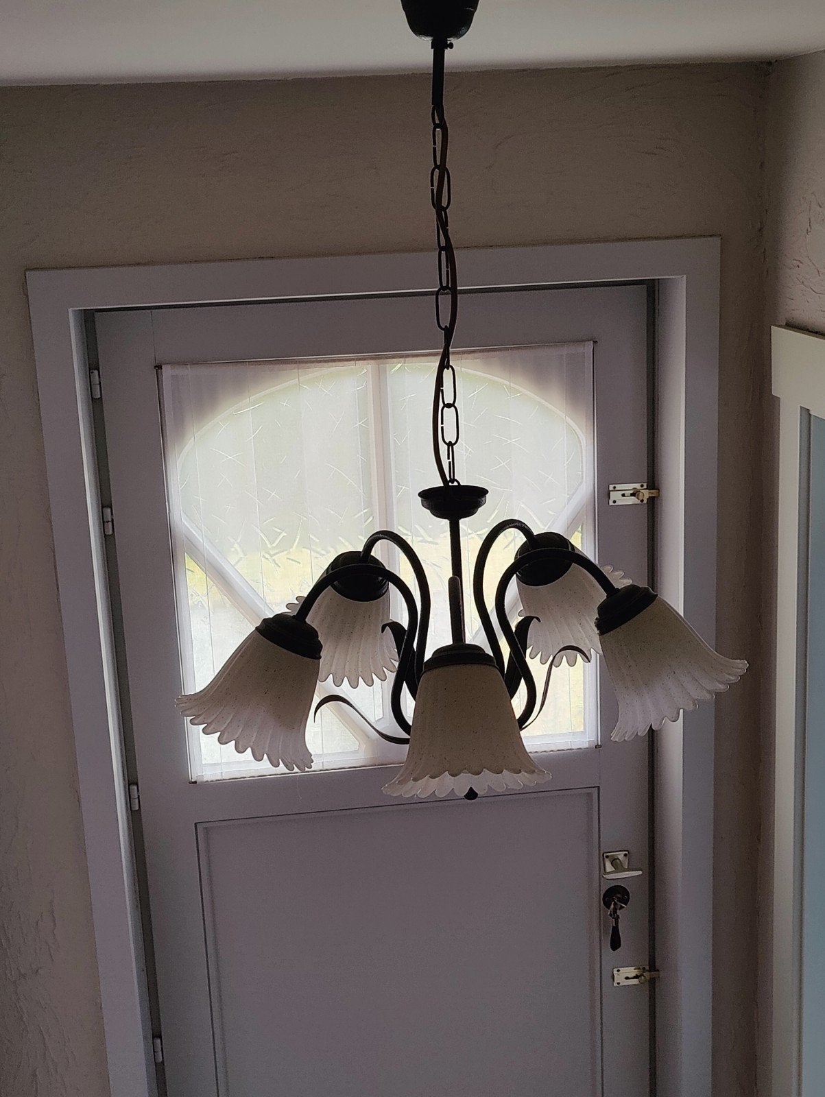 2 kroonluchters, Ophalen