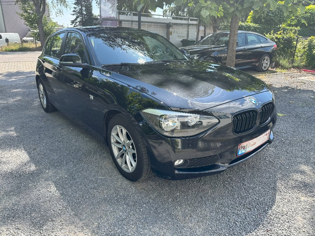 BMW 116d Checkered Flag - Airco, Autos, BMW, Euro 5, Achat, Noir, 5 portes
