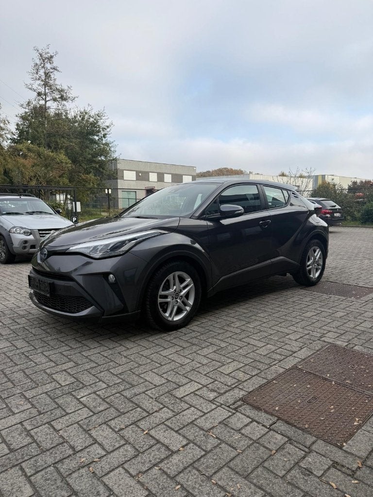 Toyota C-HR 1.8 Hybrid automaat - 58.579 km, Autos, Argent ou Gris, Achat, 725 kg, Euro 6