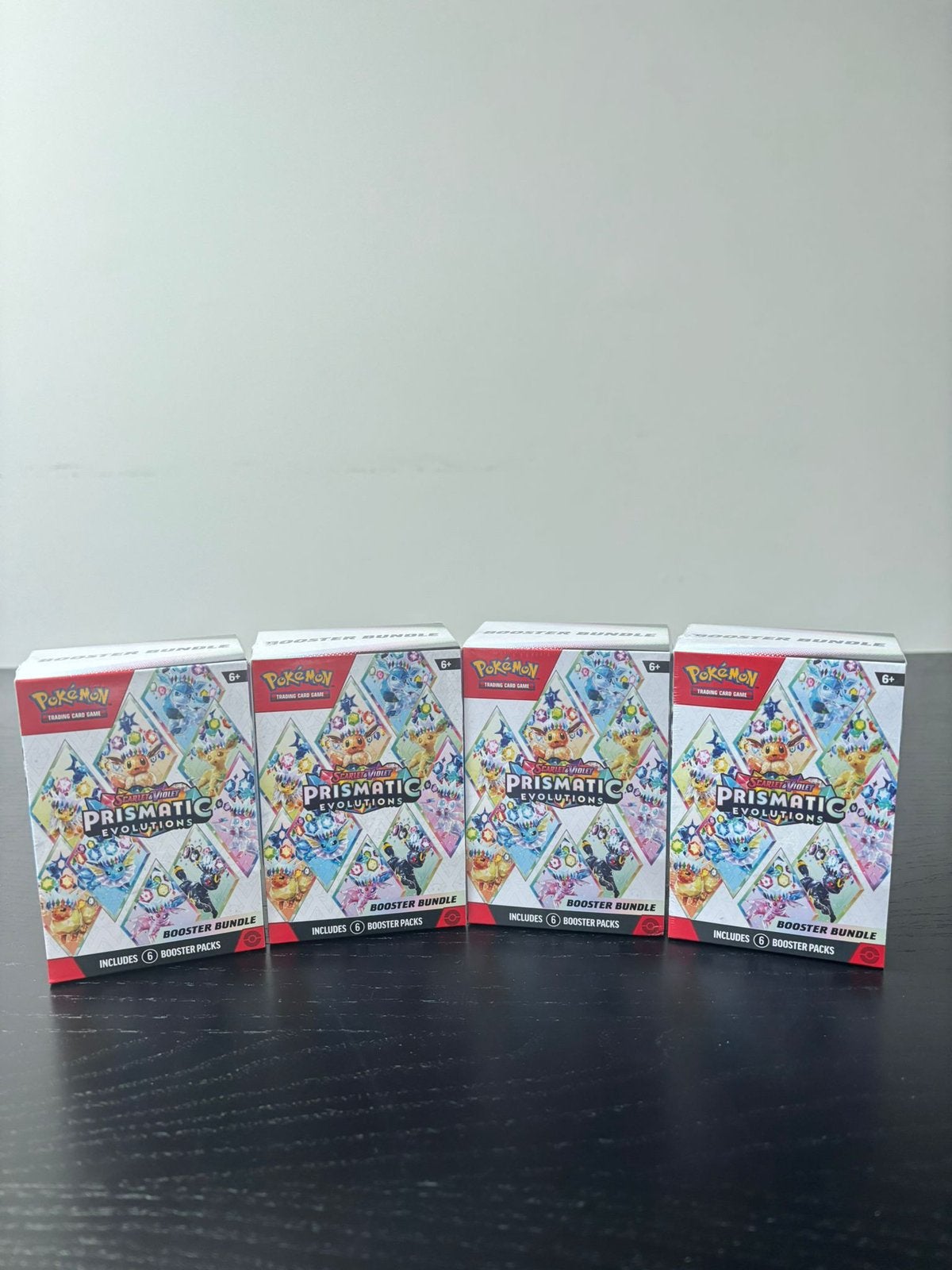 Pack de boosters Pokémon : Prismatic Evolution, Enlèvement, Neuf, Booster