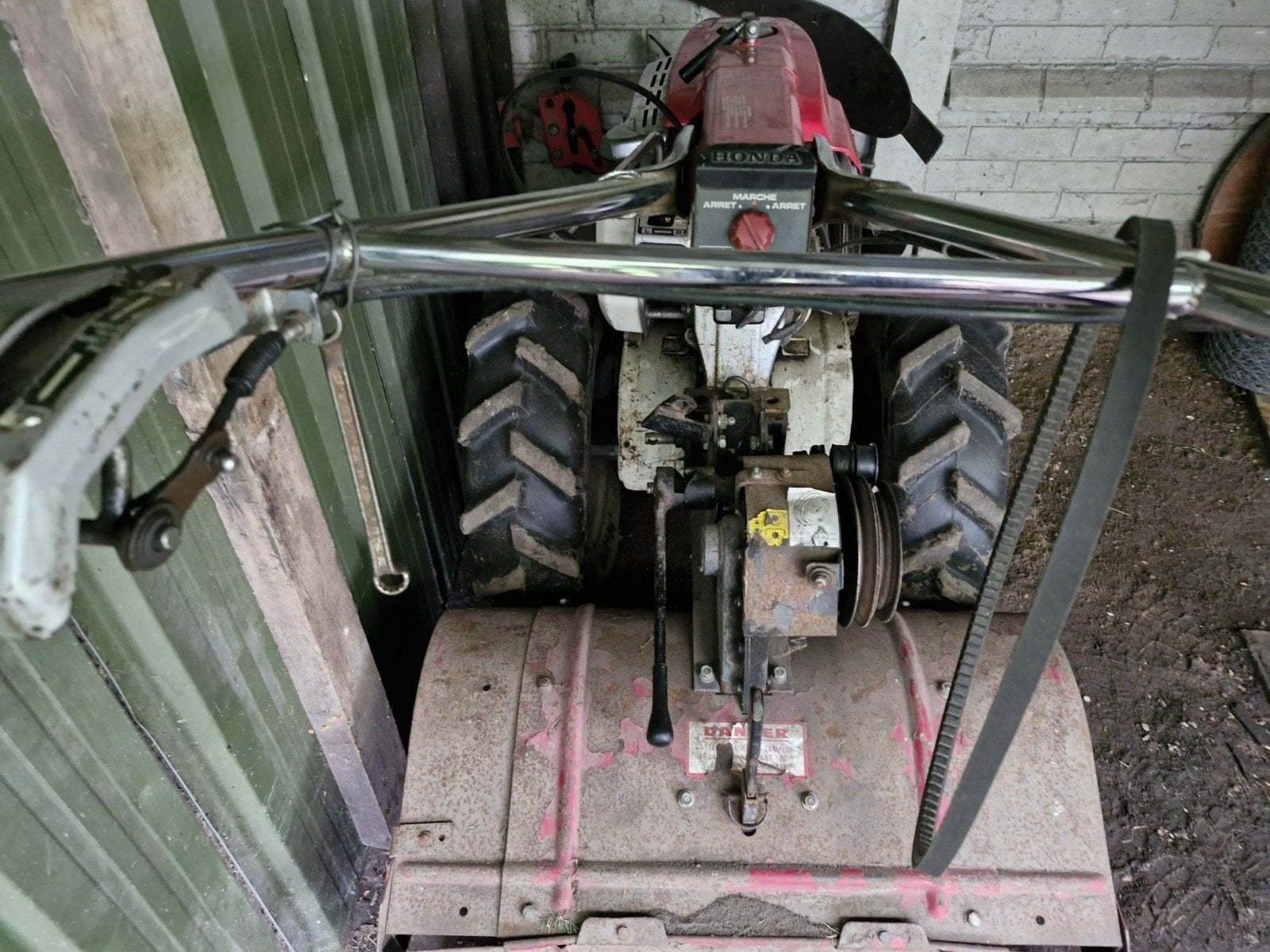 Multiculteur Honda F610 met tuinfrees en ploeg, Enlèvement