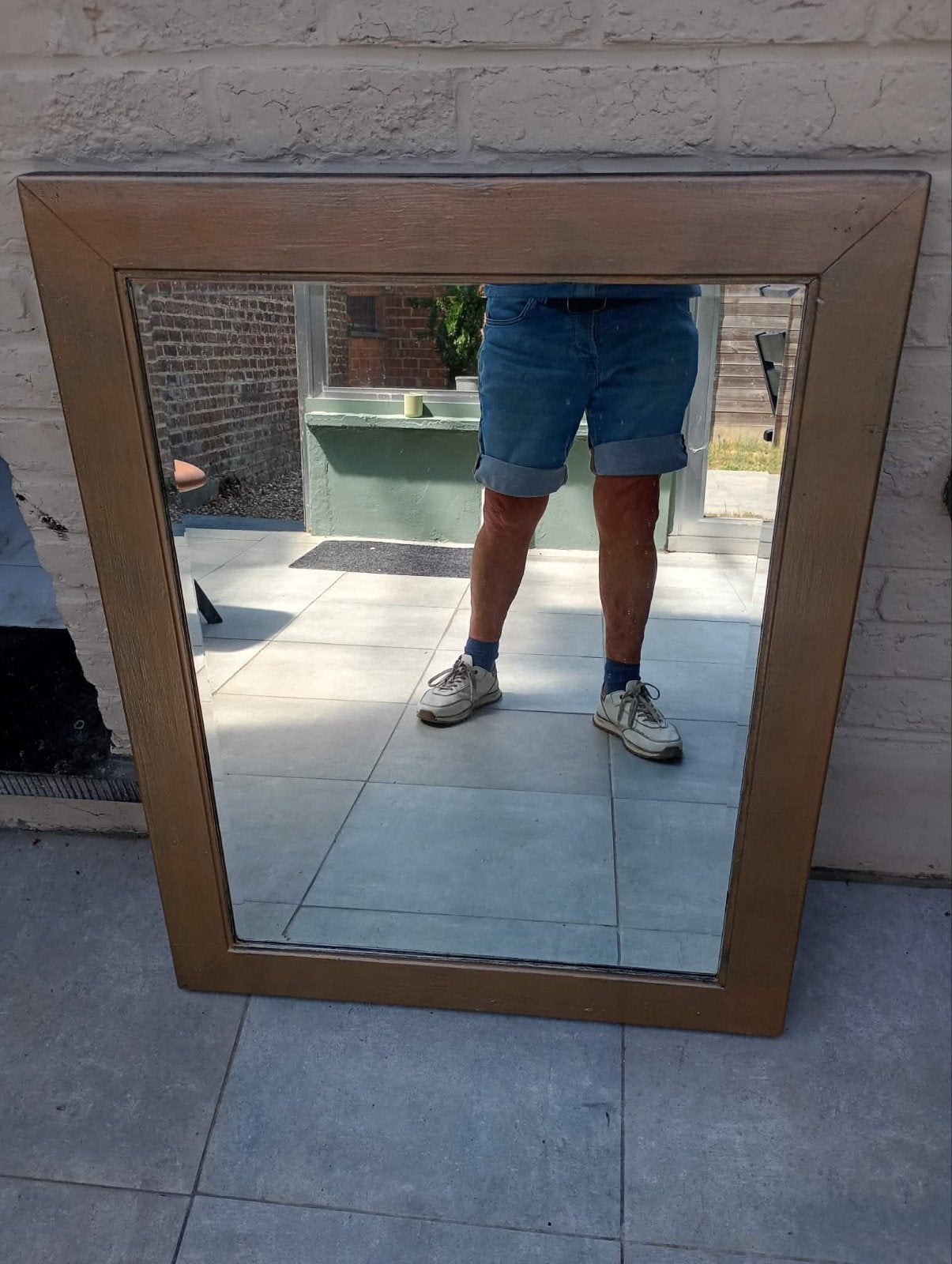 Houten spiegel, Ophalen
