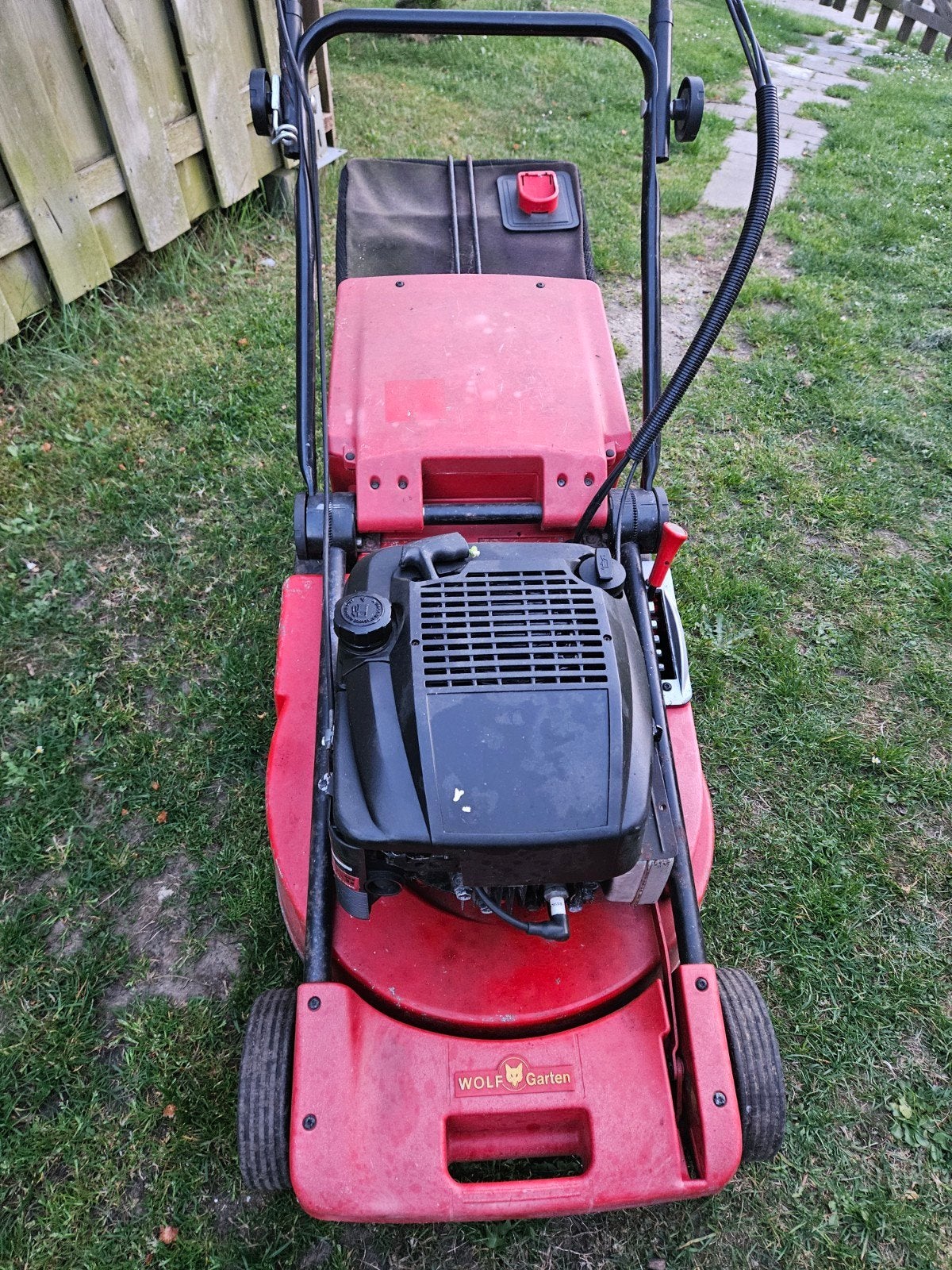 Benzine grasmaaier Wolf garten Zelftreker 50 cm in Houthalen, Tuin en Terras, Grasmaaiers, Opvangbak, Ophalen
